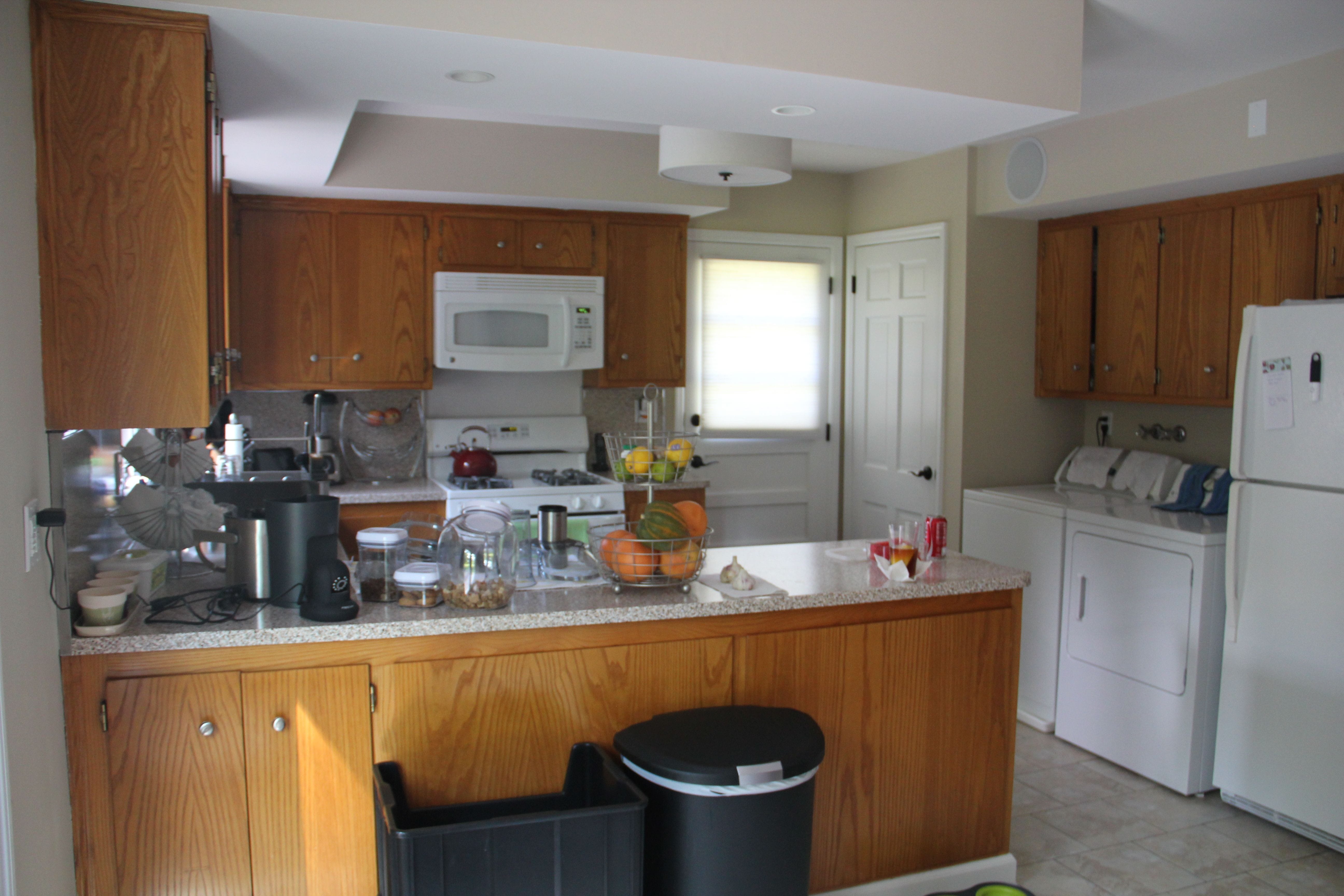 The kitchen in this home before our design and construction of this project