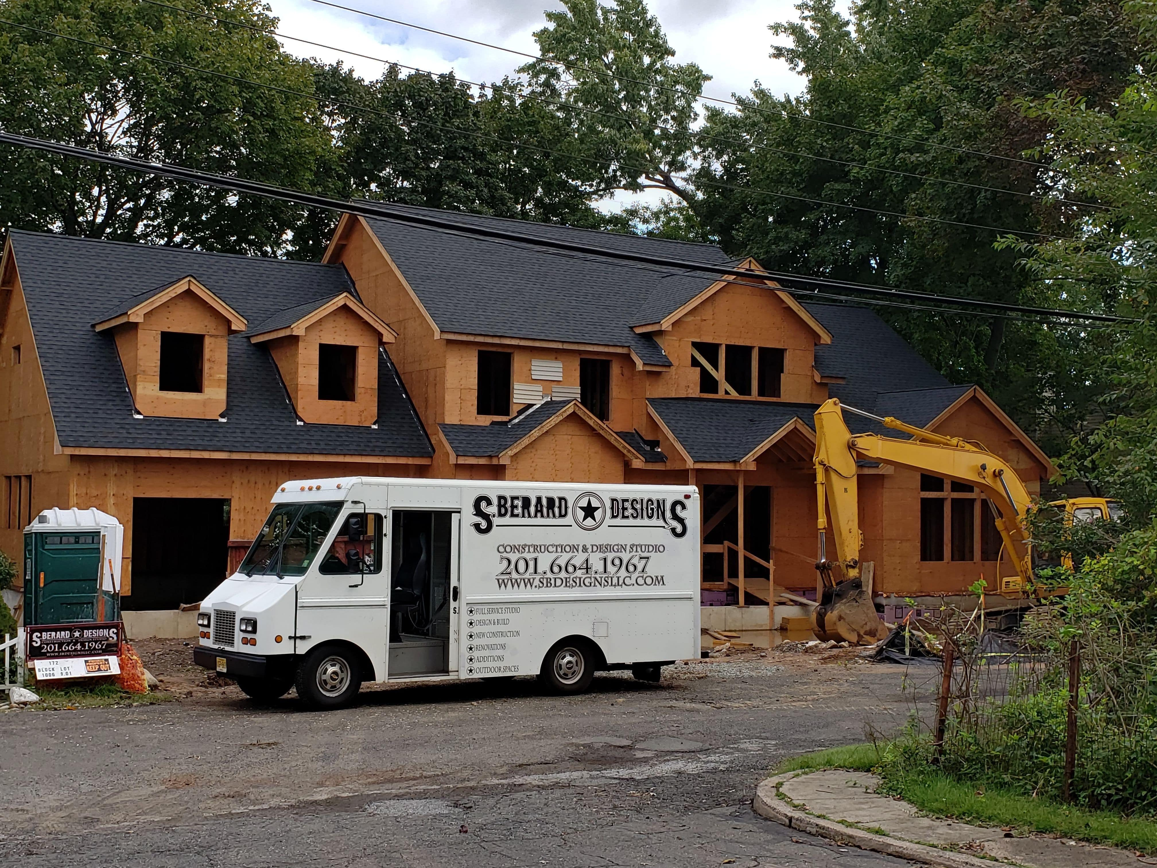 New roof shingles get installed